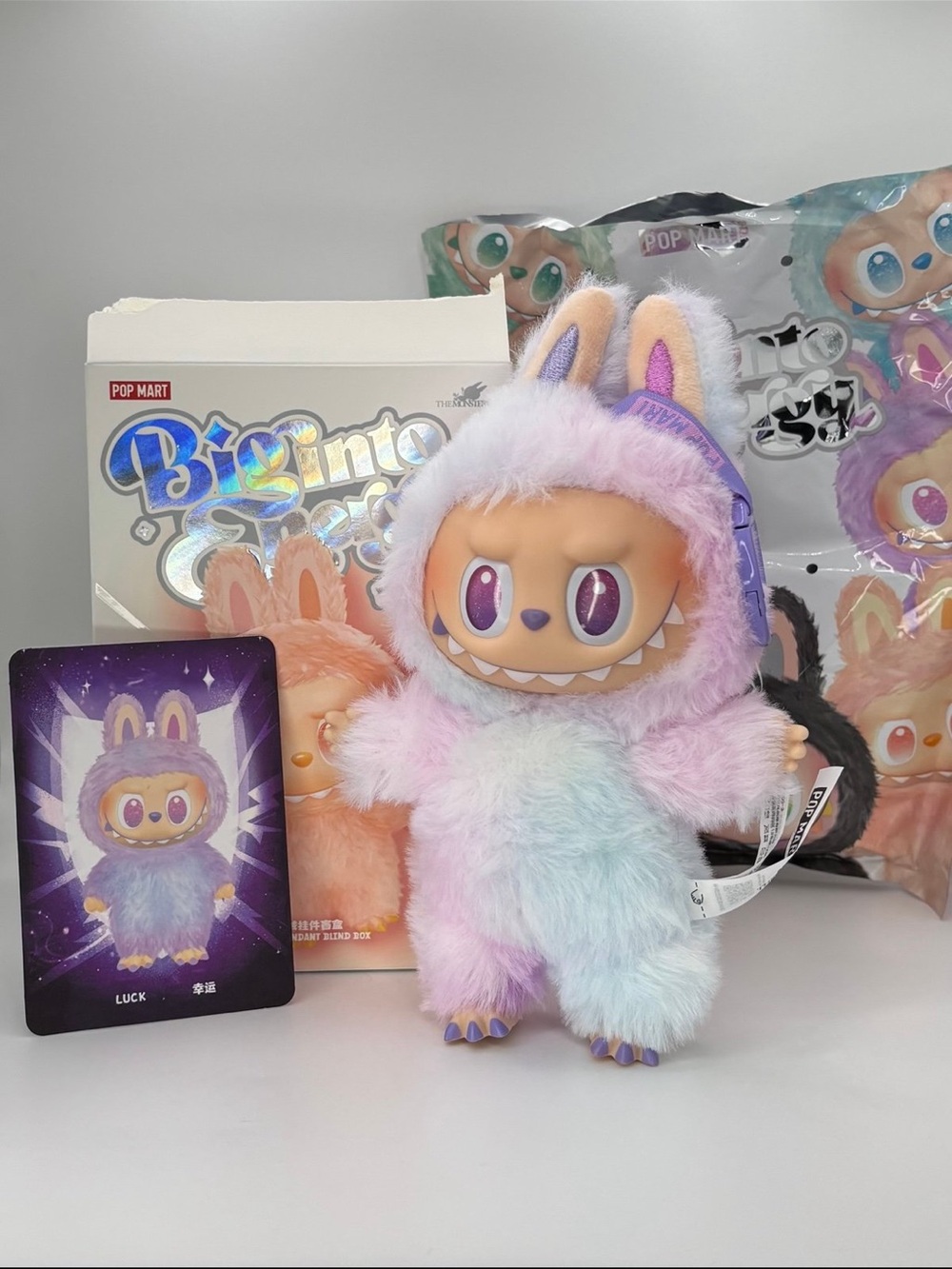 Pop mart big into energy luck labubu